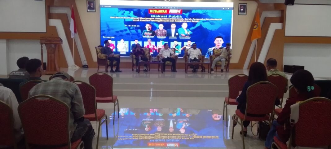 DISKUSI PUBLIK HARI BURUH INTERNASIONAL DISKUSI PUBLIK HARI BURUH INTERNASIONAL
