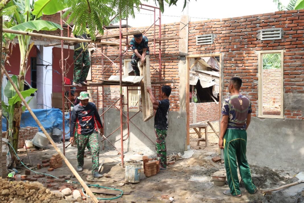 TMMD ke-130 Gowa Pacu Pembangunan Rumah Bapak Syahrir hingga Capai 42 Persen TMMD ke-130 Gowa Pacu Pembangunan Rumah Bapak Syahrir hingga Capai 42 Persen